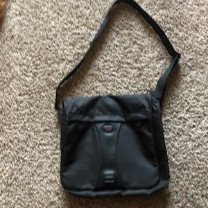 TUMI small computer/tablet shoulder bag.
